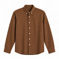 long-sleeve button-down shirt with a textured fabric and light-colored buttons.