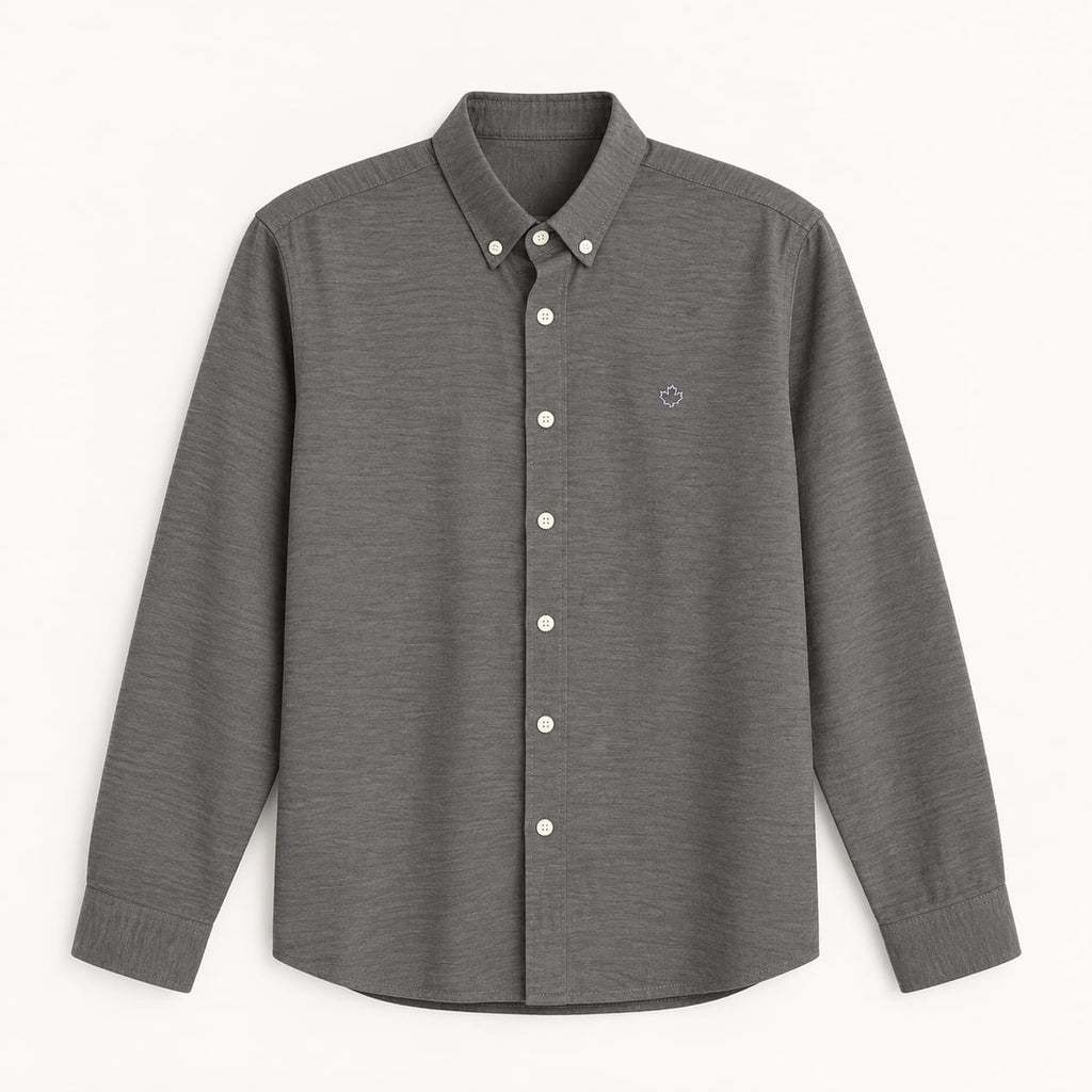 long-sleeve button-down shirt with a textured fabric and light-colored buttons.