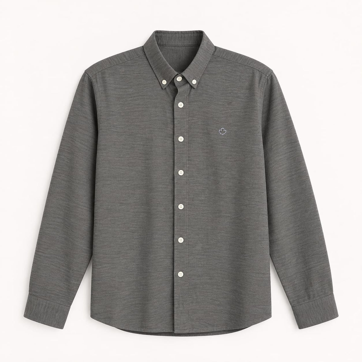 long-sleeve button-down shirt with a textured fabric and light-colored buttons.